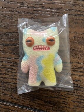 Pastel Swirl Vinyl Monster Figurine with Orange Eyes